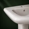 VONDDW Glossy White Sleek Cylindrical One-Piece Floorstanding Ceramic Pedestal Basin Sink (3) VONDDW Glossy White Sleek Cylindrical One-Piece Floorstanding Ceramic Pedestal Basin Sink